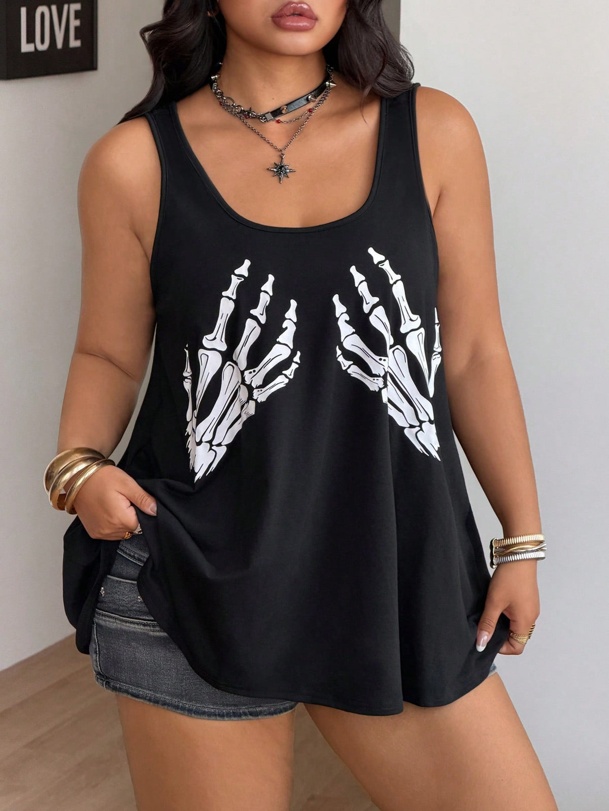 Women's camouflage print tank top featuring a scoop neckline and knitted stretch fabric in army green.