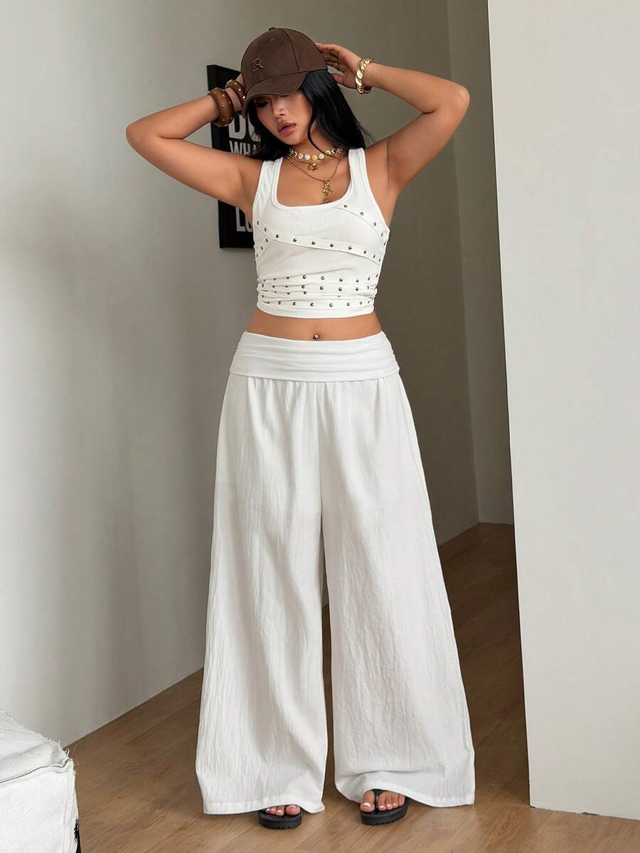 Women's plus size wide leg cotton pants featuring a relaxed loose fit and high waist design.