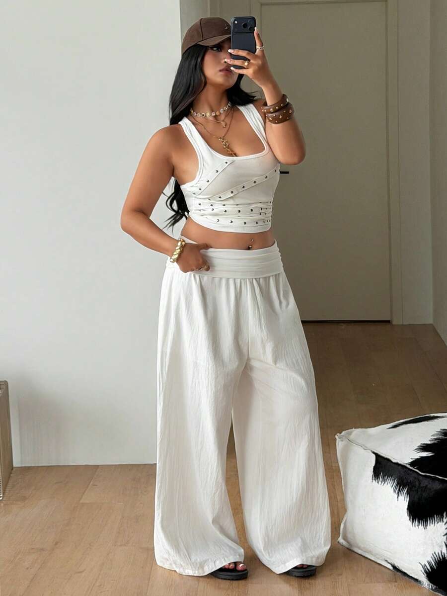 Women's plus size wide leg cotton pants featuring a relaxed loose fit and high waist design.