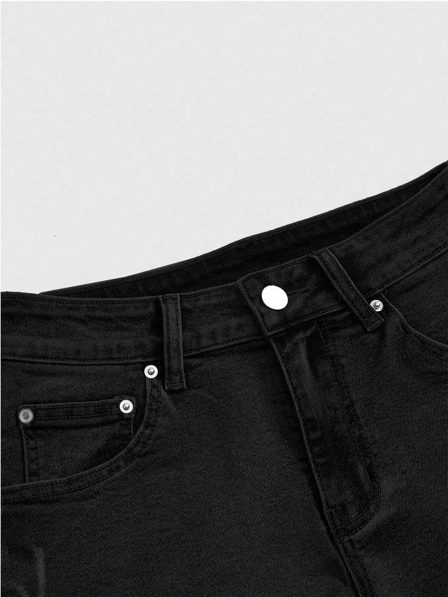 Women's ultra low waist mini shorts with back pockets, zipper fly, button detail, random print, and star patch in a grunge punk Y2K style.