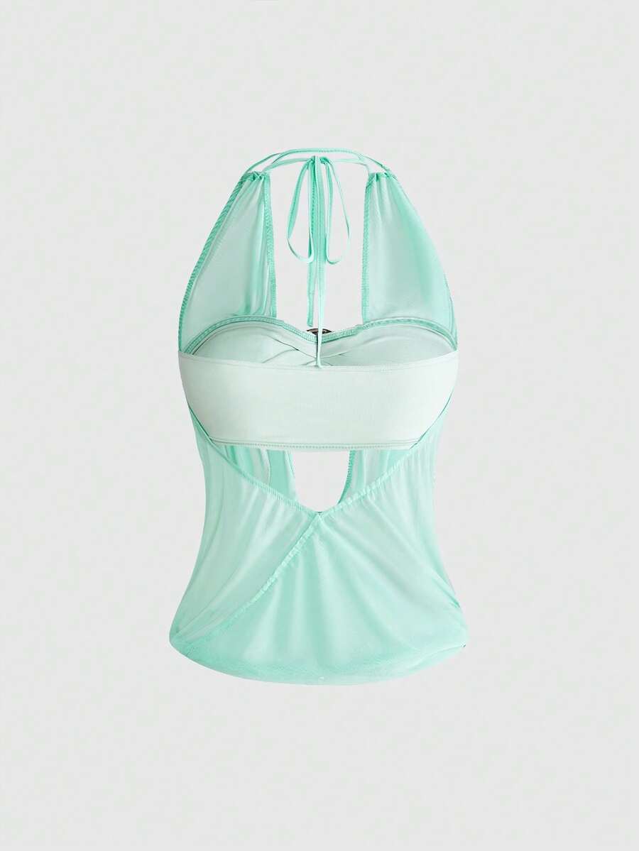 Women's Y2K retro crop tank top with draped halter neckline, cut-out detail, slim fit, and backless design