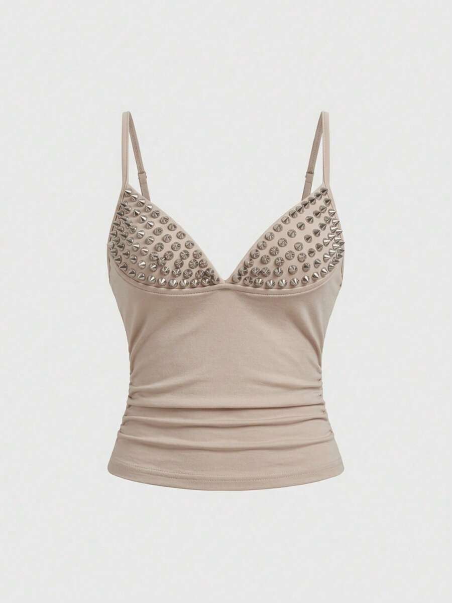 Women's slim fit sleeveless crop top featuring spaghetti straps, ruched detailing, and studded rhinestone accents.