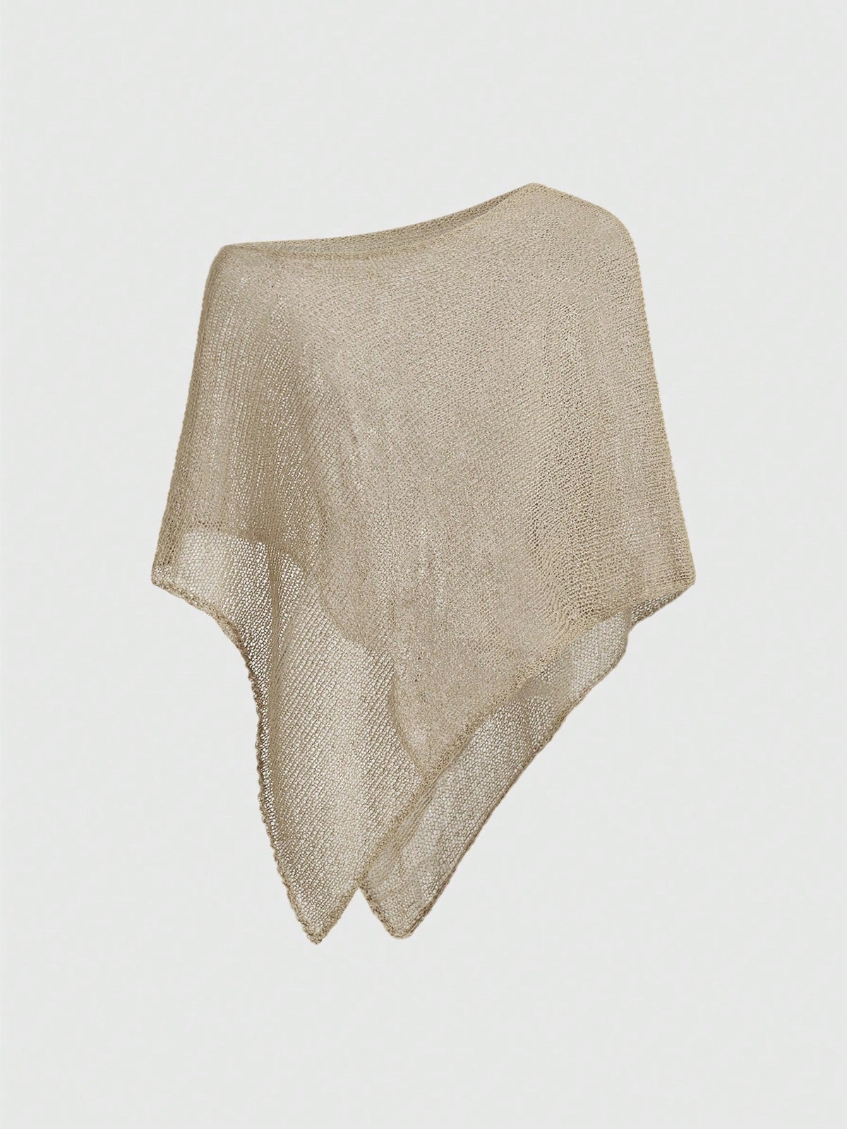 Women's casual hollow knit poncho top with boat neck, cloak sleeves, and asymmetrical hem