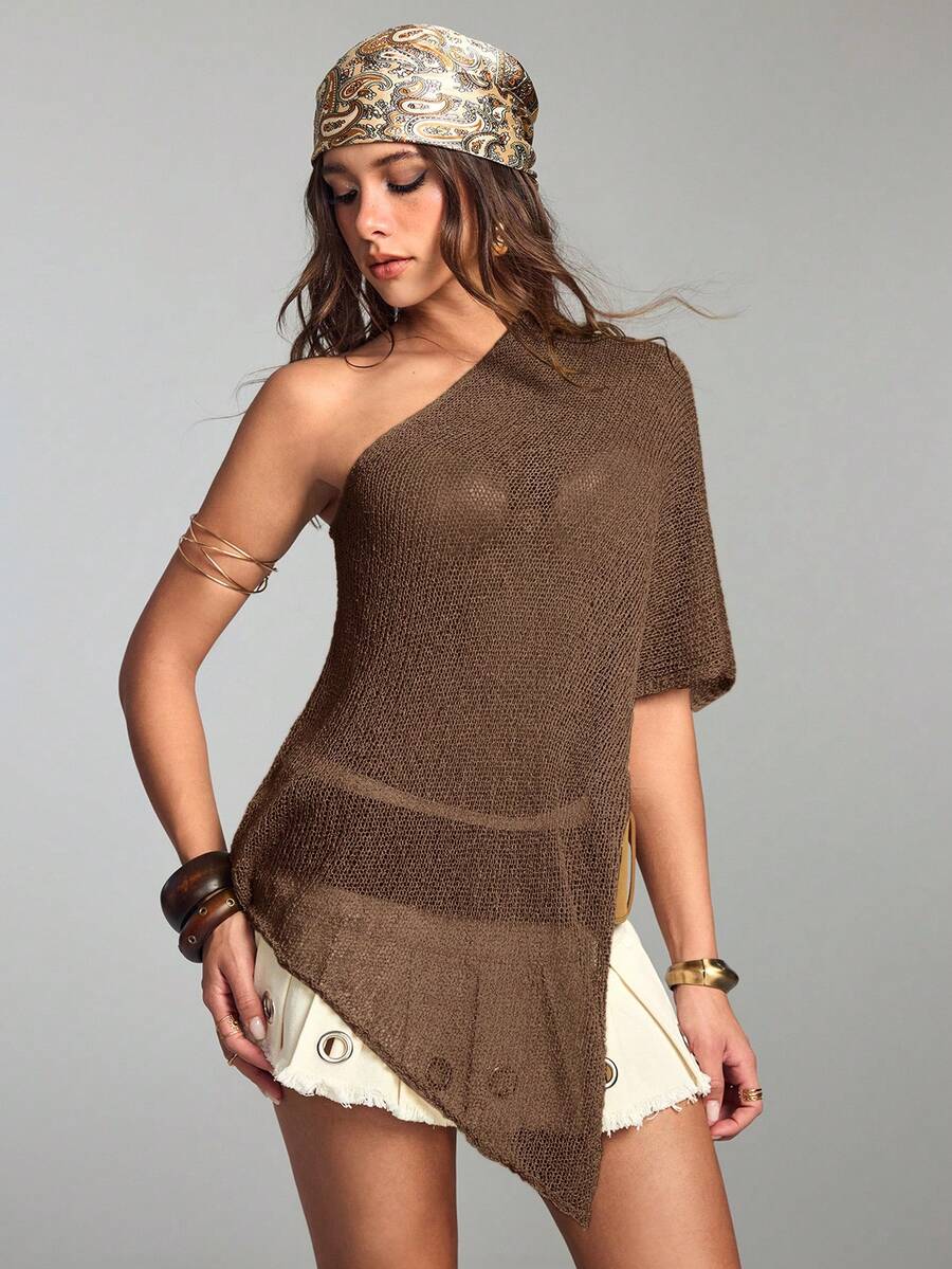 Women's casual hollow knit poncho top with boat neck, cloak sleeves, and asymmetrical hem