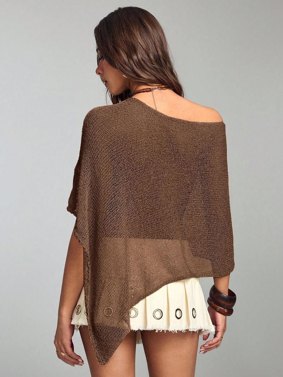 Women's casual hollow knit poncho top with boat neck, cloak sleeves, and asymmetrical hem