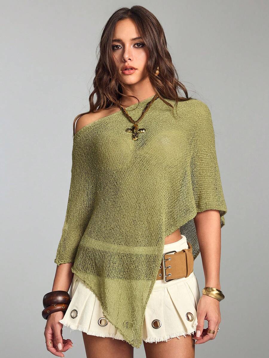 Women's casual hollow knit poncho top with boat neck, cloak sleeves, and asymmetrical hem