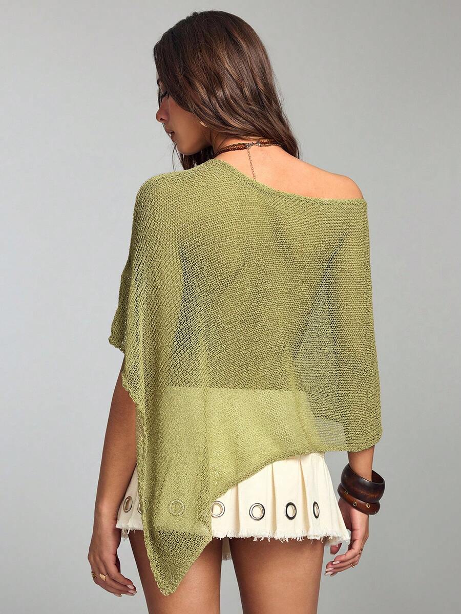 Women's casual hollow knit poncho top with boat neck, cloak sleeves, and asymmetrical hem