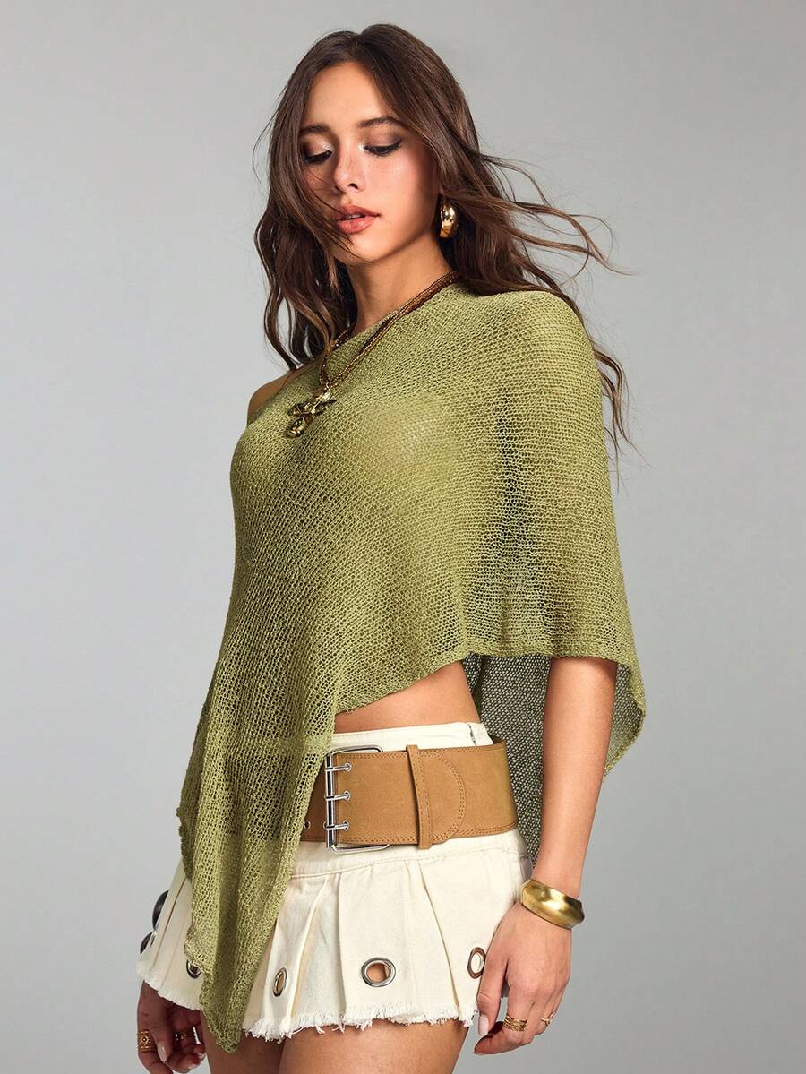 Women's casual hollow knit poncho top with boat neck, cloak sleeves, and asymmetrical hem