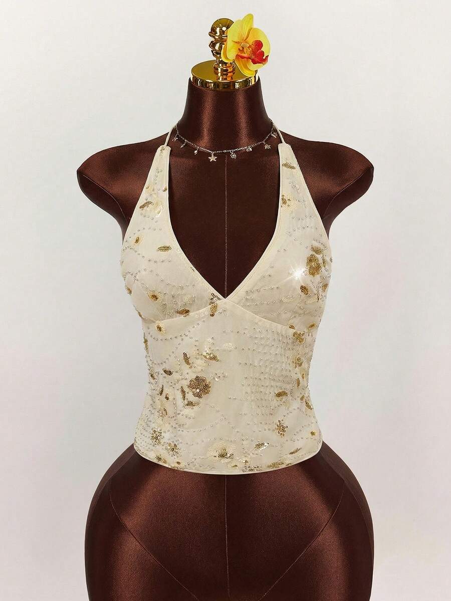 Women's embroidered sequin halter cami top featuring a deep V-neck, backless party design, and slim fit silhouette.