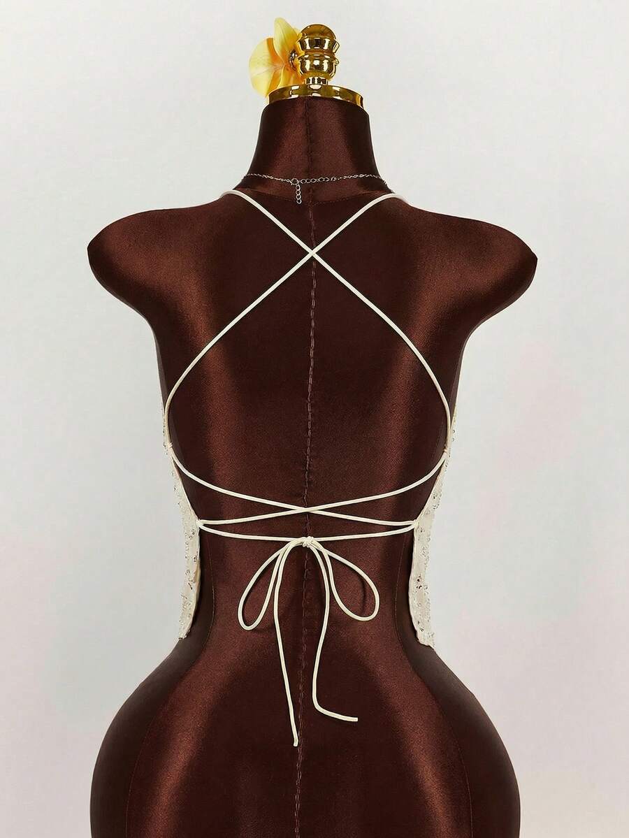 Women's embroidered sequin halter cami top featuring a deep V-neck, backless party design, and slim fit silhouette.