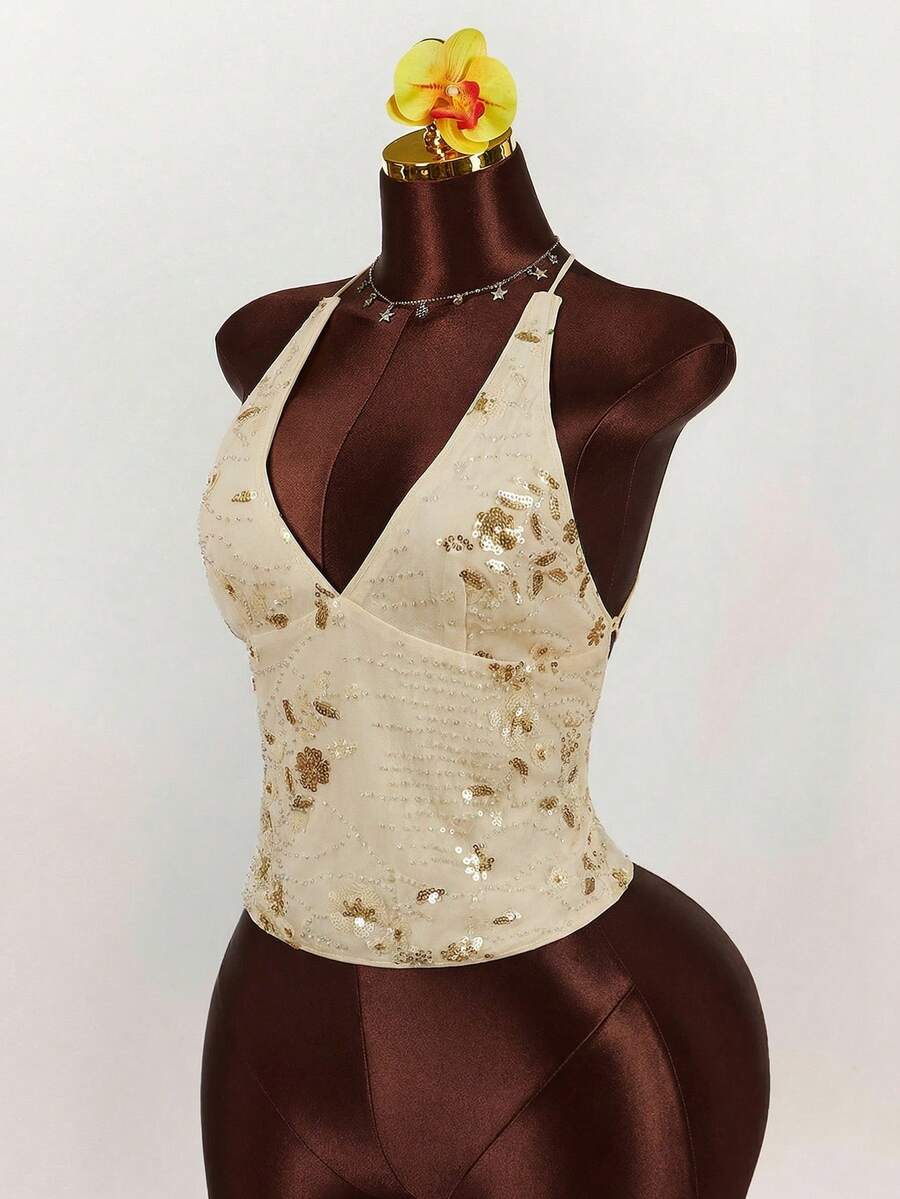 Women's embroidered sequin halter cami top featuring a deep V-neck, backless party design, and slim fit silhouette.