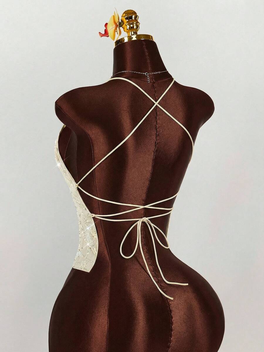 Women's embroidered sequin halter cami top featuring a deep V-neck, backless party design, and slim fit silhouette.