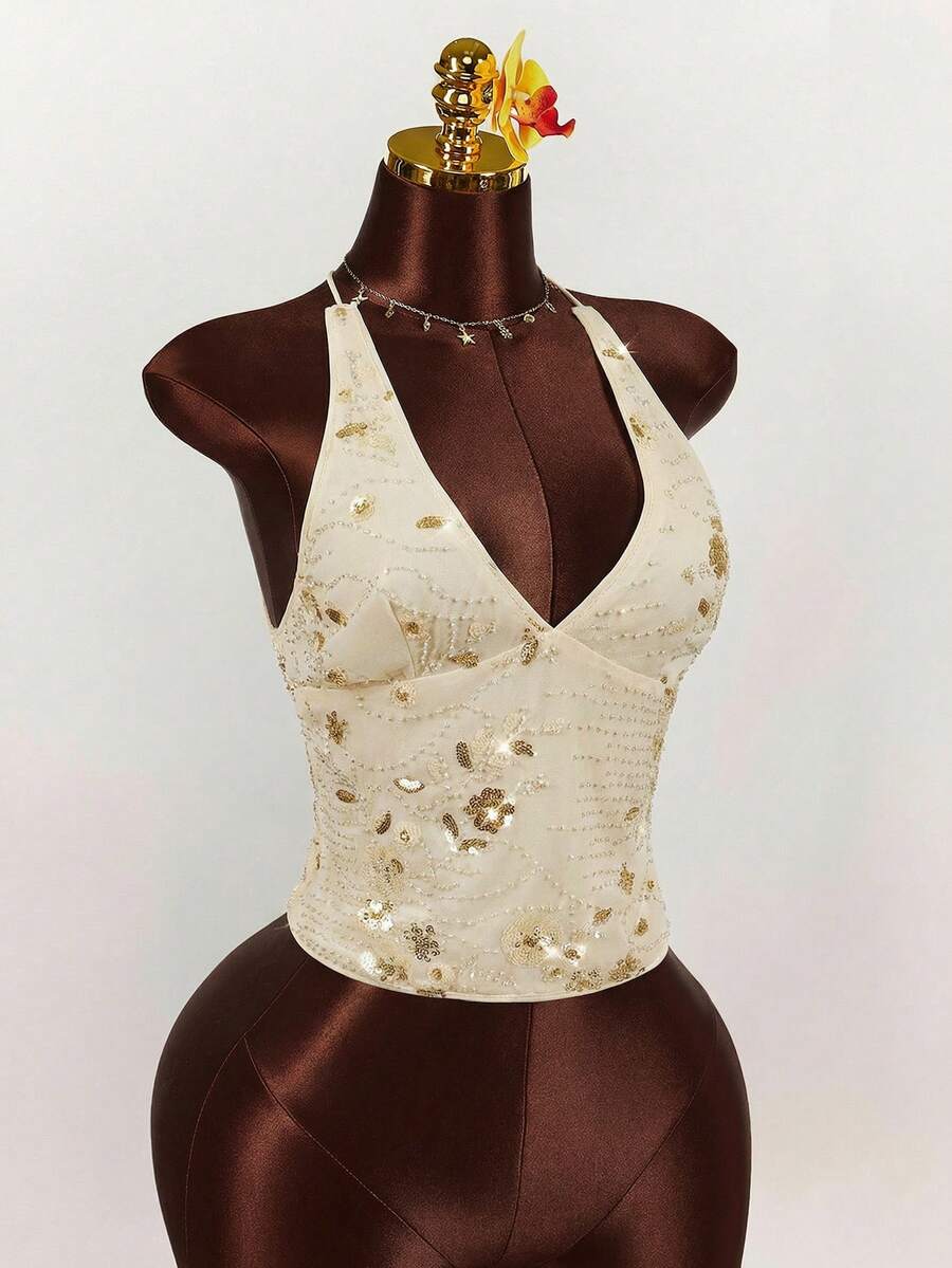 Women's embroidered sequin halter cami top featuring a deep V-neck, backless party design, and slim fit silhouette.