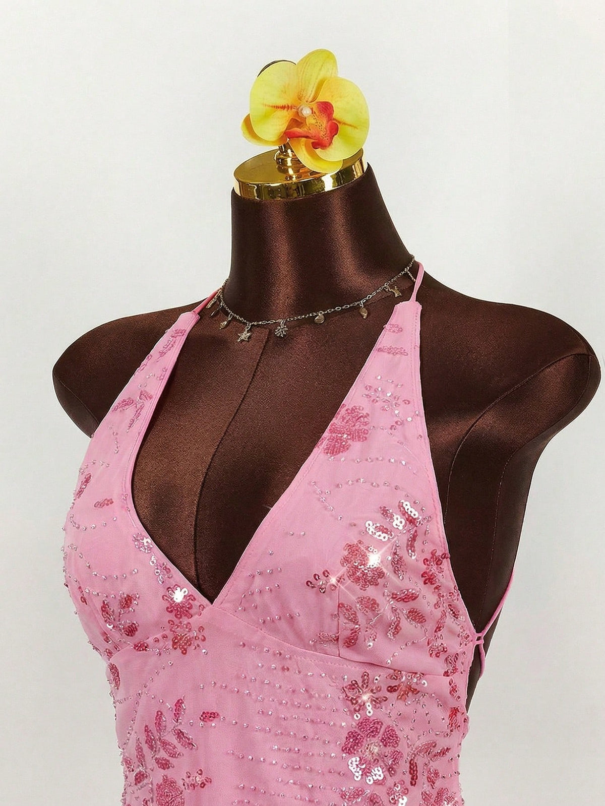 Women's embroidered sequin halter cami top featuring a deep V-neck, backless party design, and slim fit silhouette.