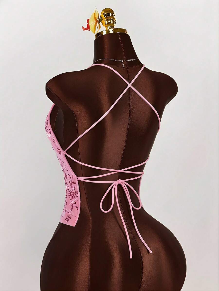 Women's embroidered sequin halter cami top featuring a deep V-neck, backless party design, and slim fit silhouette.