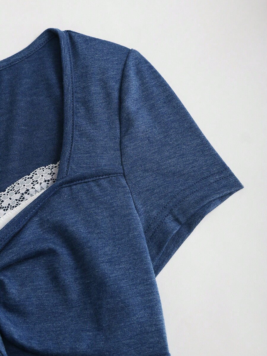 Women's casual short sleeve rib-knit t-shirt with a square neckline, contrast lace detailing, and ruched front.