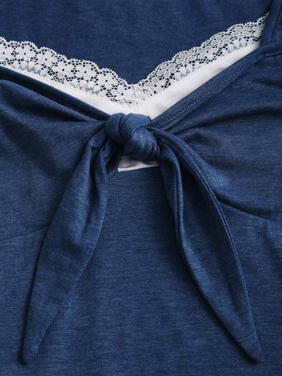 Women's casual short sleeve rib-knit t-shirt with a square neckline, contrast lace detailing, and ruched front.