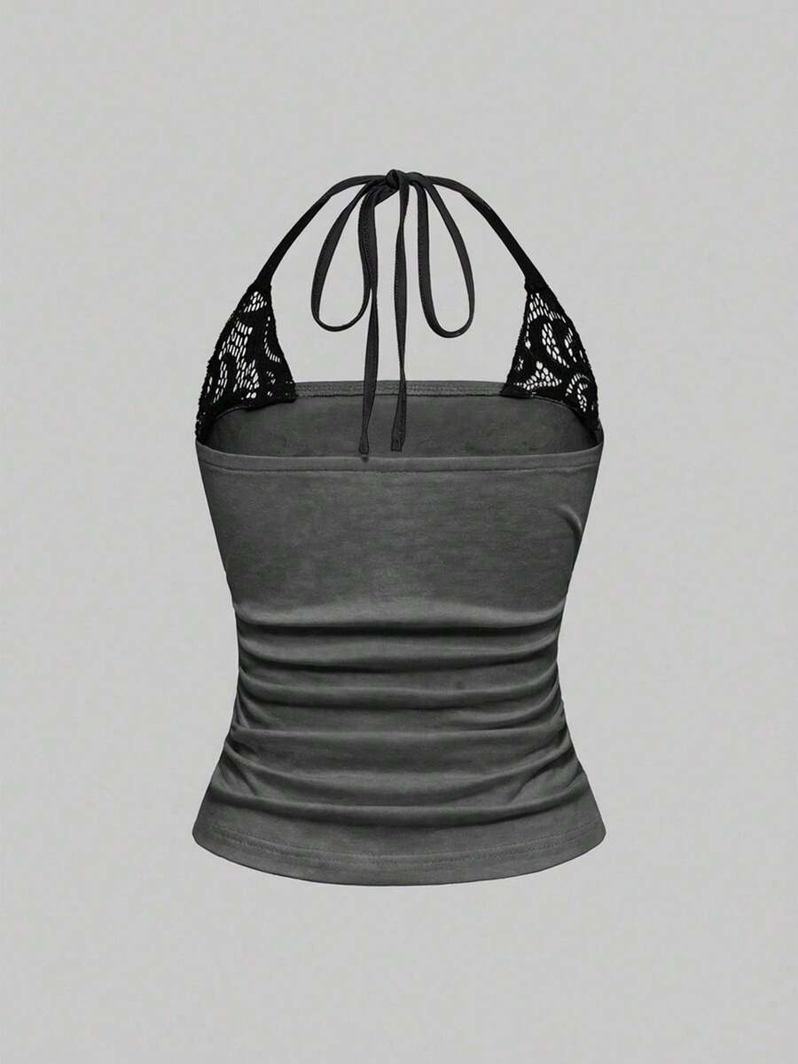 Women's cropped Y2K punk print halter cami top with contrast lace, backless knot detail, and slim fit knitted fabric