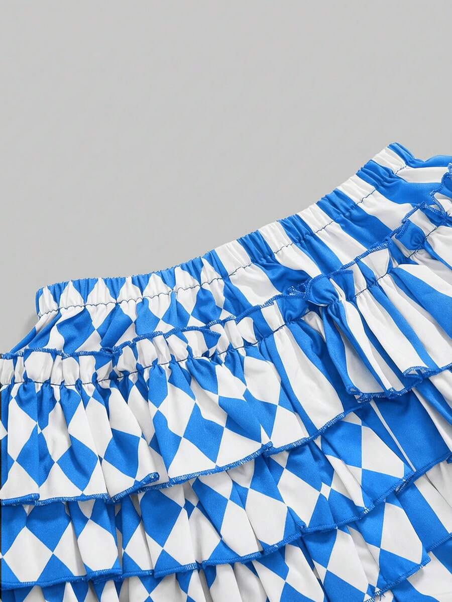 Black and white striped and geometric patchwork gothic pumpkin shorts for women featuring tiered ruffle hems and an elastic waistband.