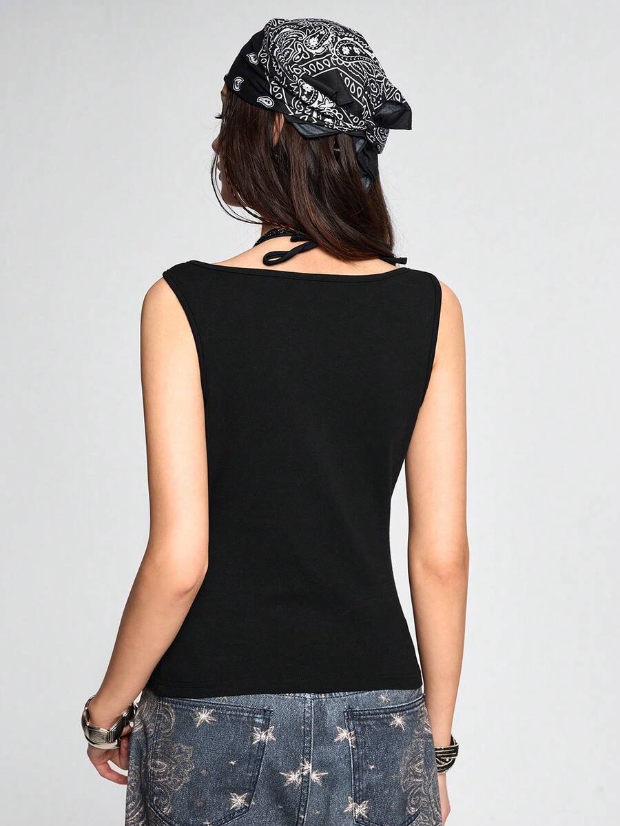 Front view of women's round neck slim fit cotton knit camisole featuring fringe ripped hollow-out detailing.
