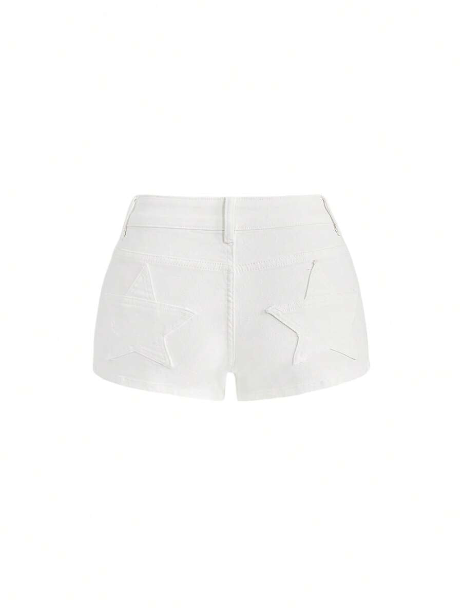 Women's ultra low waist mini shorts with back pockets, zipper fly, button detail, random print, and star patch in a grunge punk Y2K style.