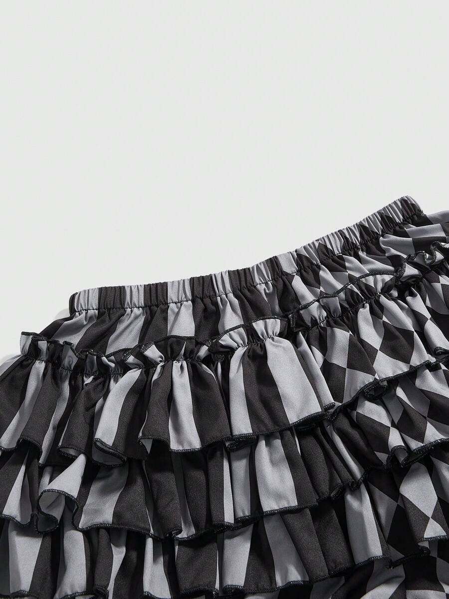 Women's gothic patchwork pumpkin shorts with tiered ruffle hem and geometric striped plaid pattern.