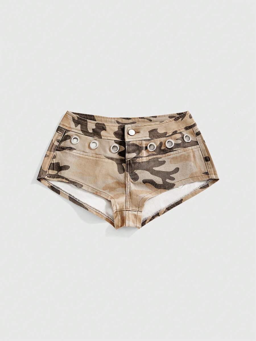 Women's ultra low waist camouflage mini skort shorts with zipper fly, button detail, and grommet eyelet accents.