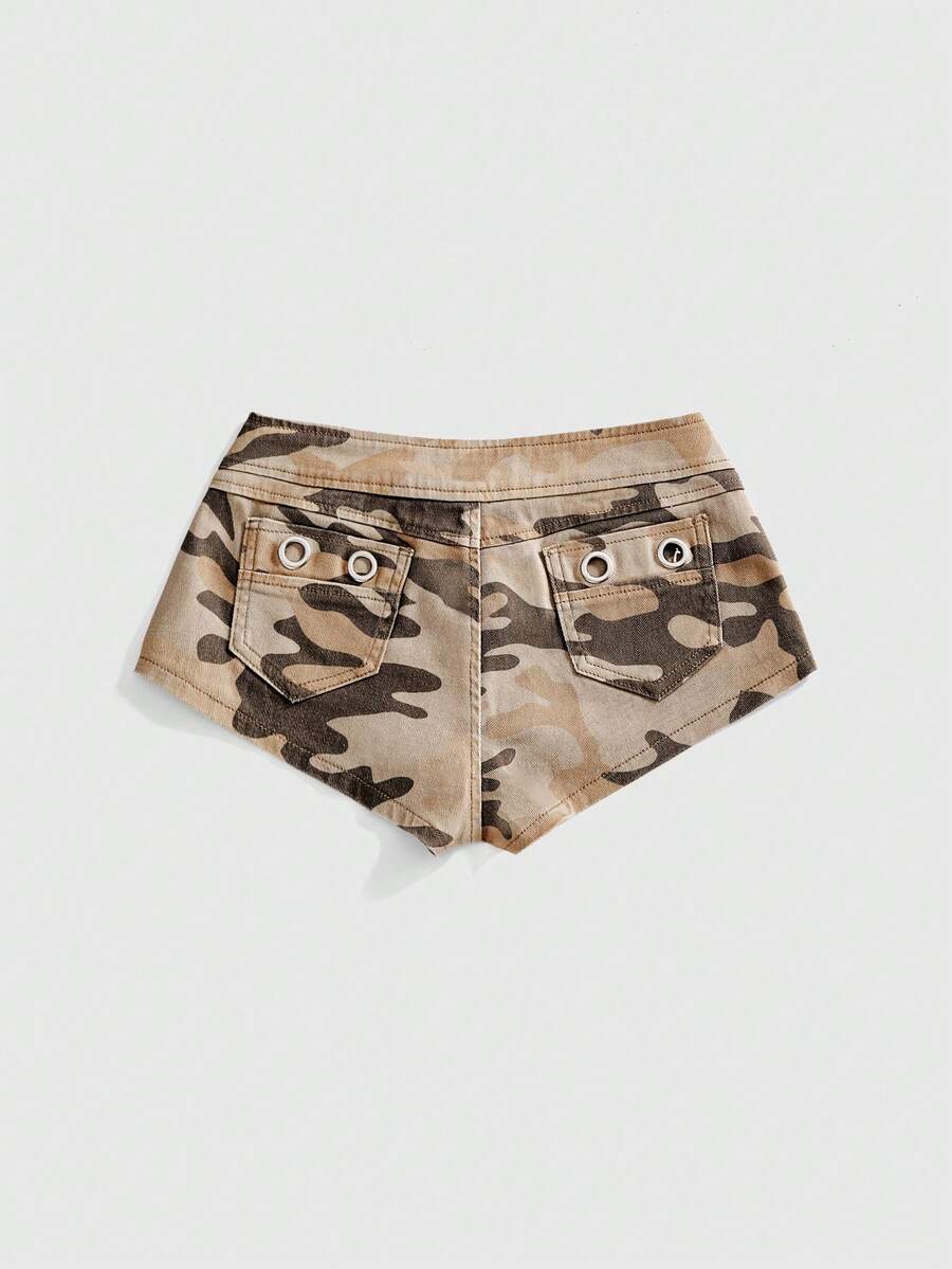 Women's ultra low waist camouflage mini skort shorts with zipper fly, button detail, and grommet eyelet accents.