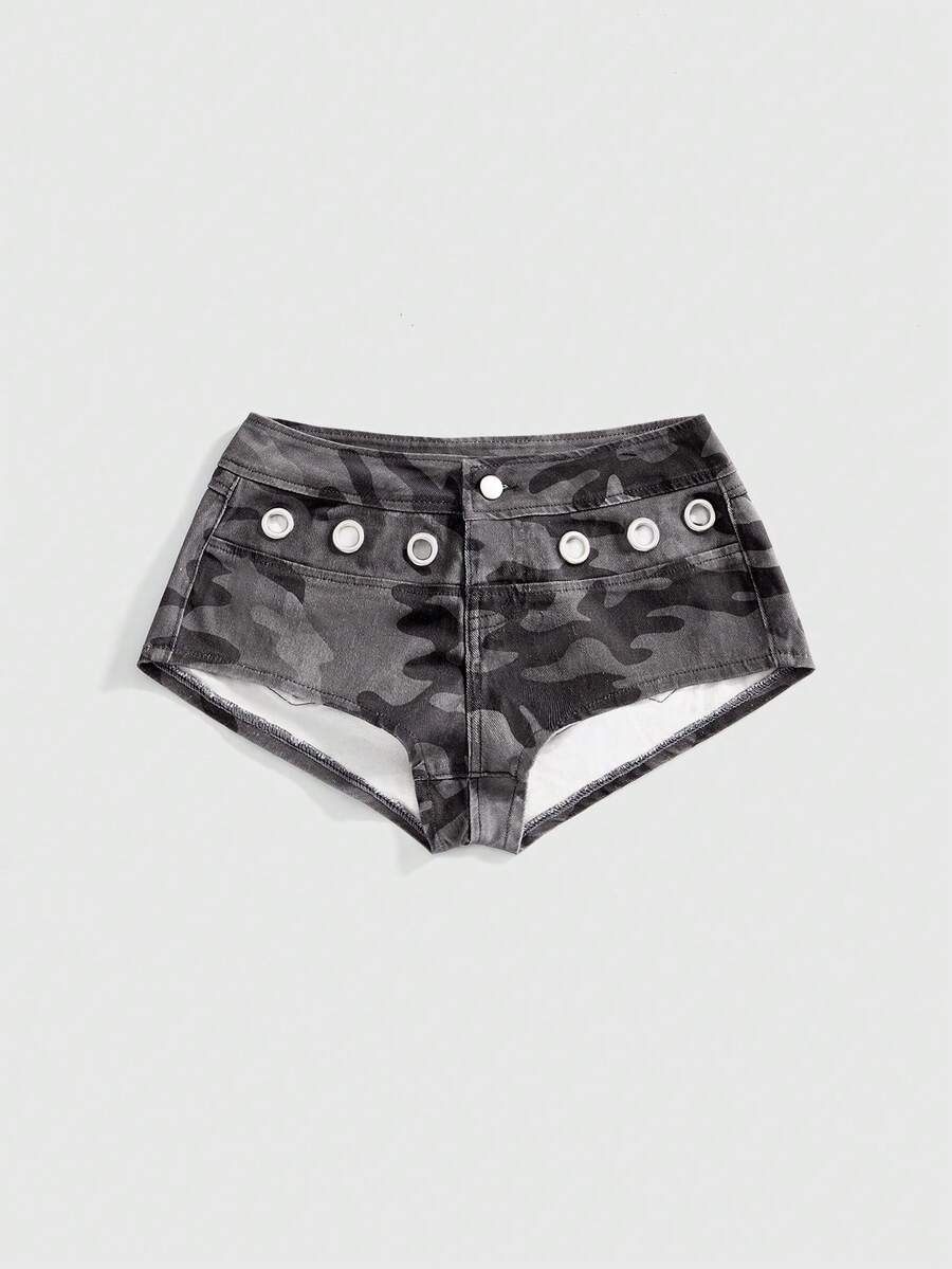 Women's ultra low waist camouflage mini skort shorts with zipper fly, button detail, and grommet eyelet accents.
