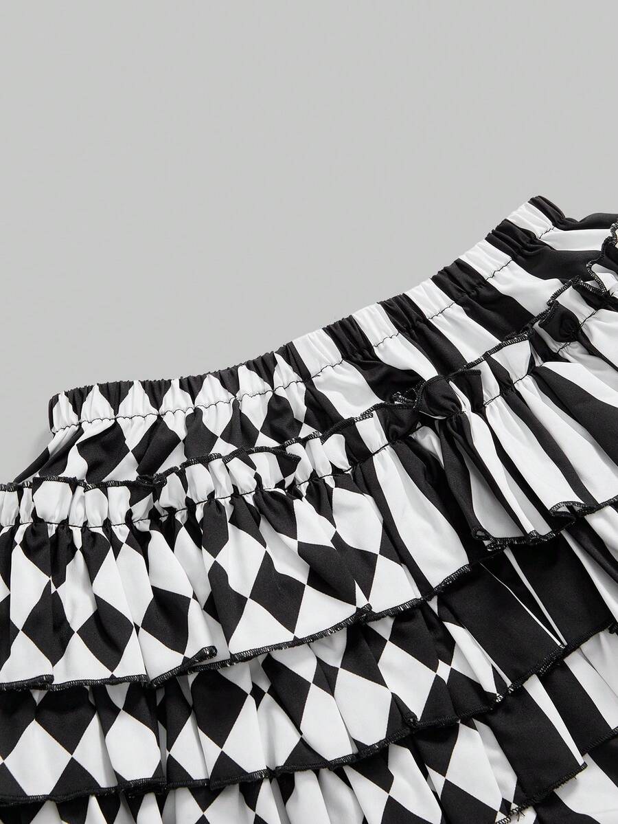 Women's gothic patchwork pumpkin shorts with tiered ruffle hem and geometric striped plaid pattern.