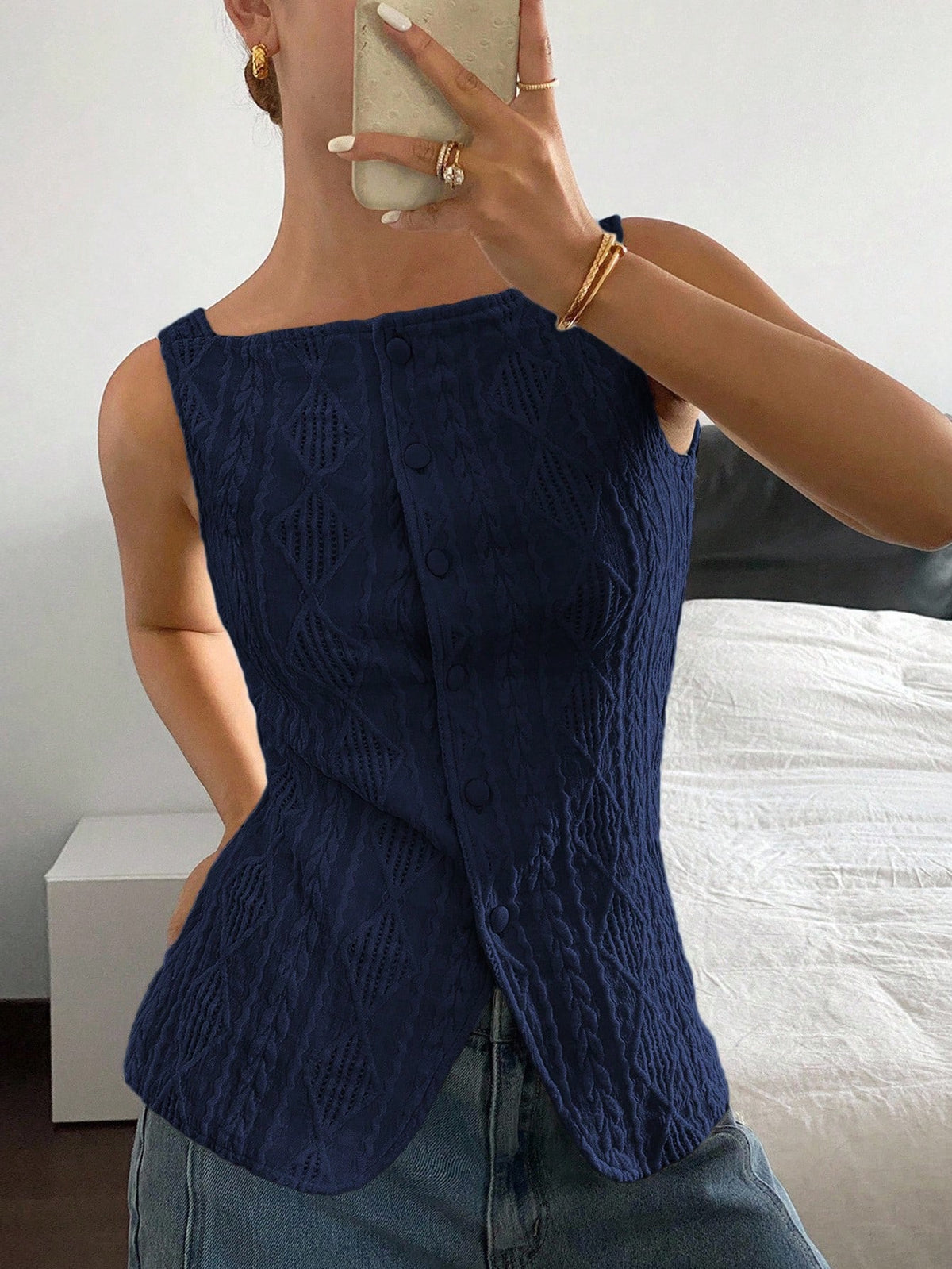 Striped ribbed knit tank top for women featuring a button-down front, sleeveless design, and slim fit silhouette.