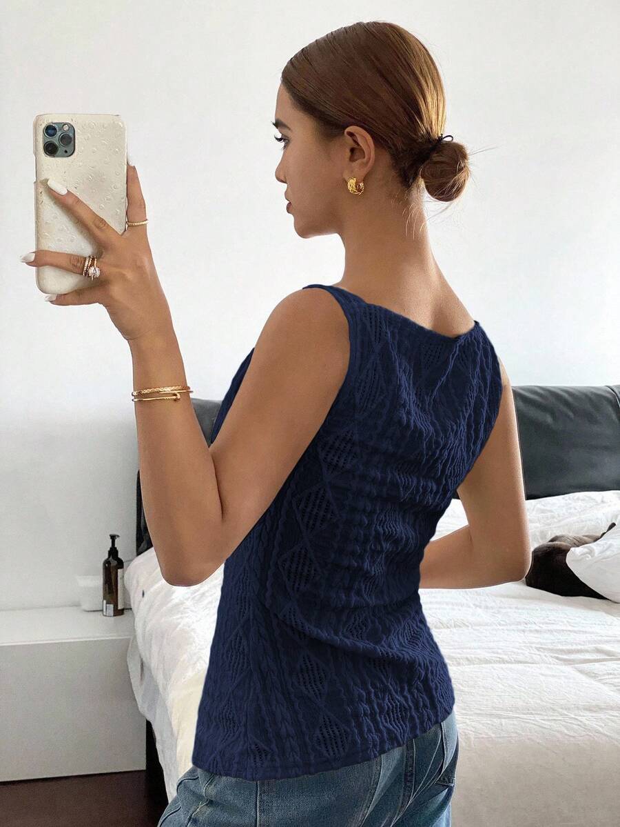 Striped ribbed knit tank top for women featuring a button-down front, sleeveless design, and slim fit silhouette.