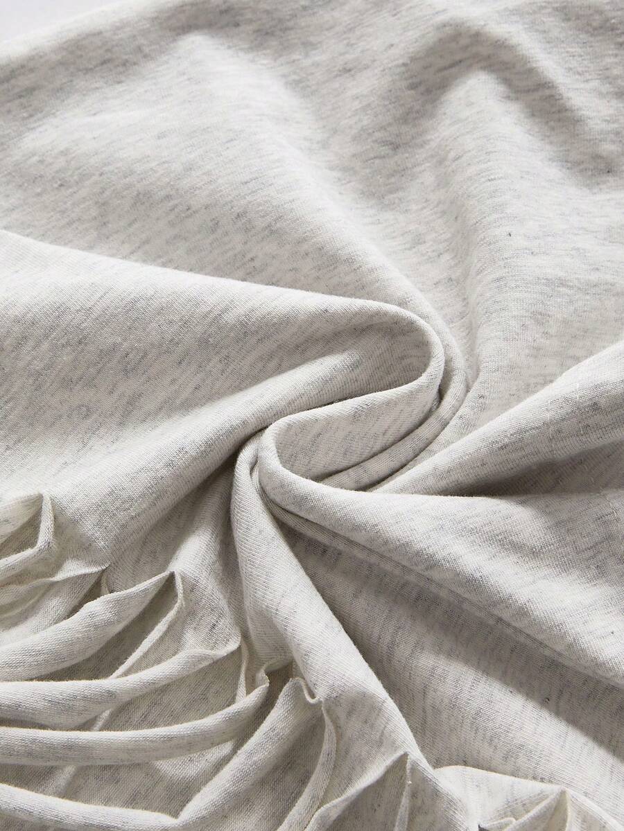 Women's grunge punk style short sleeve t-shirt featuring an asymmetrical neckline, hollow-out cut detail, and relaxed batwing sleeves in a soft cotton stretch fabric.