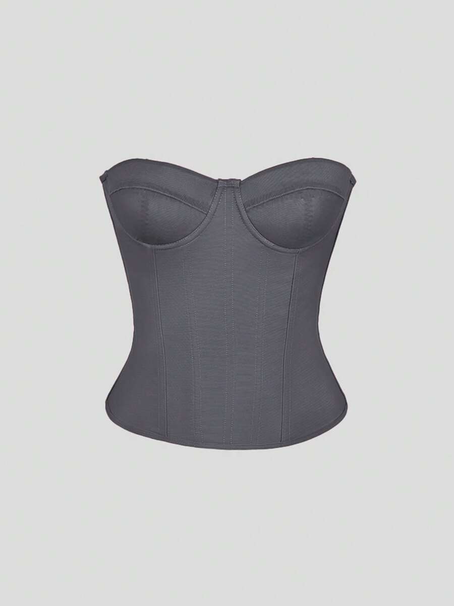 Solid color strapless corset tube top featuring a backless lace-up back design and cropped slim fit.