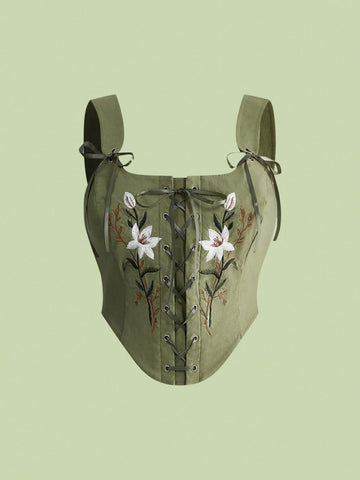 Green plus size floral embroidered camisole crop top featuring lace-up eyelets and an asymmetrical hem.