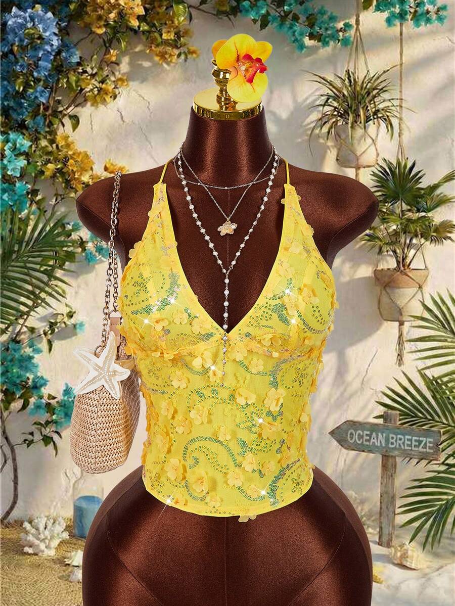 Women's embroidered sequin halter cami top featuring a deep V-neck, backless party design, and slim fit silhouette.