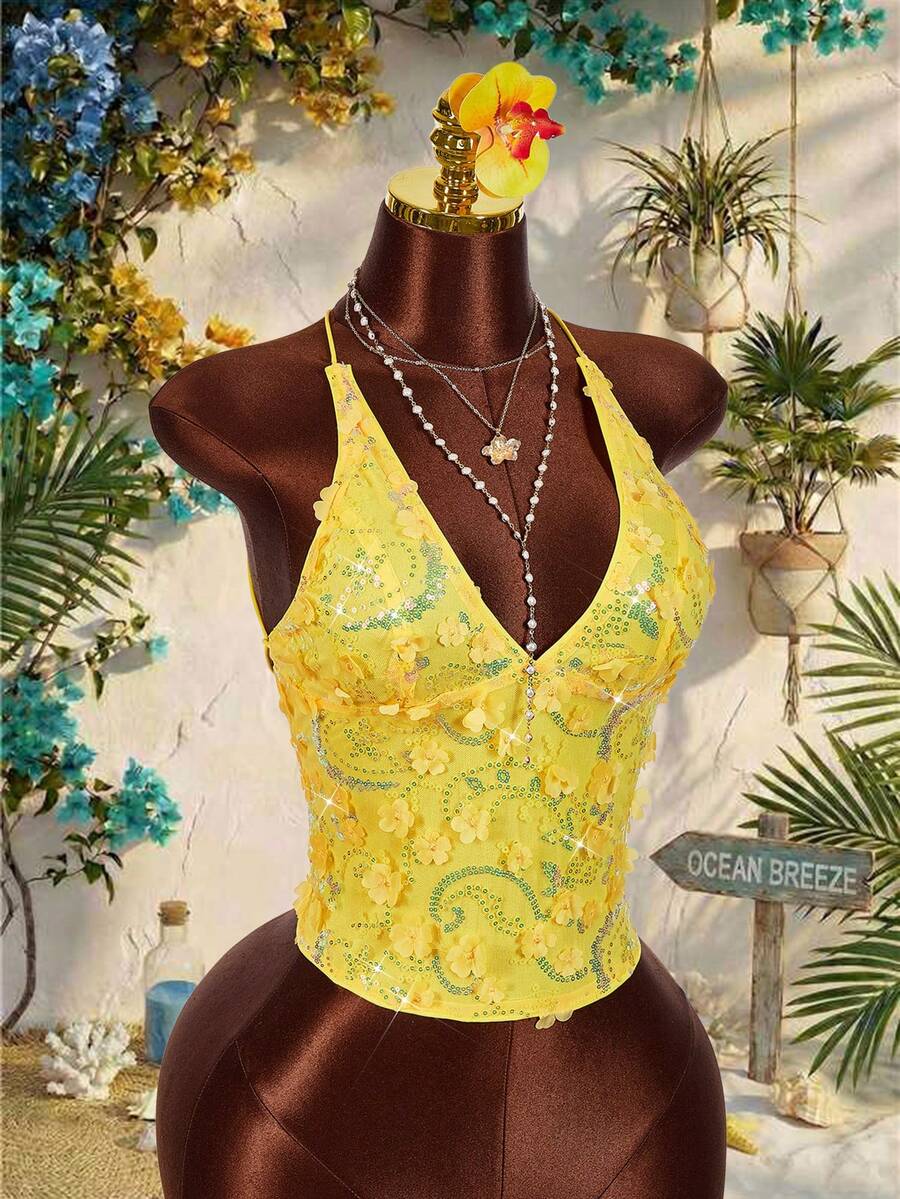 Women's embroidered sequin halter cami top featuring a deep V-neck, backless party design, and slim fit silhouette.