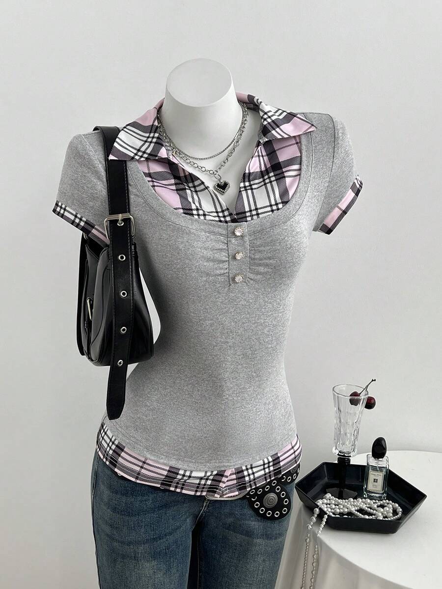 Women's black short sleeve slim fit 2-in-1 t-shirt with a plaid patchwork shirt collar detail.