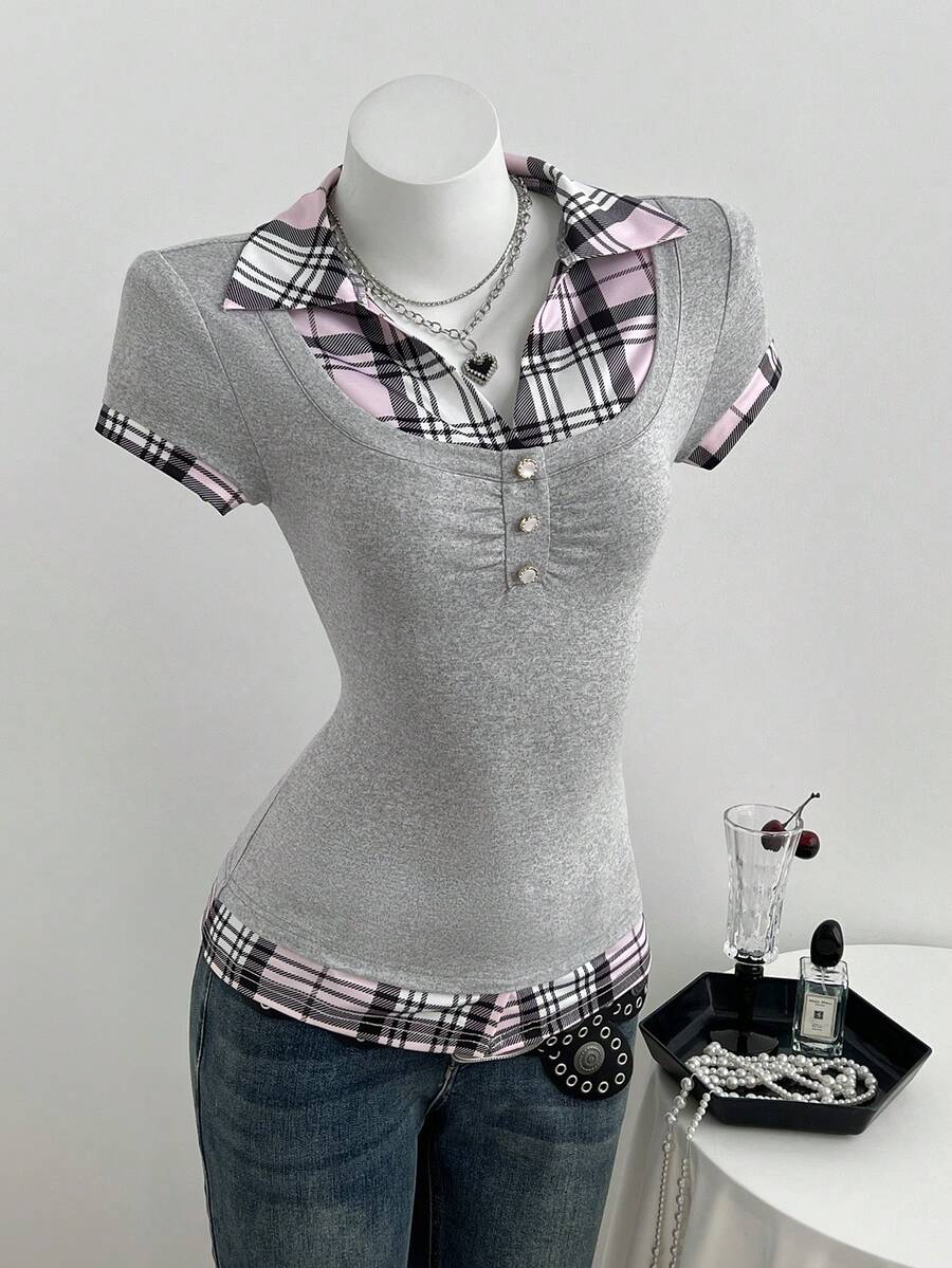 Women's black short sleeve slim fit 2-in-1 t-shirt with a plaid patchwork shirt collar detail.