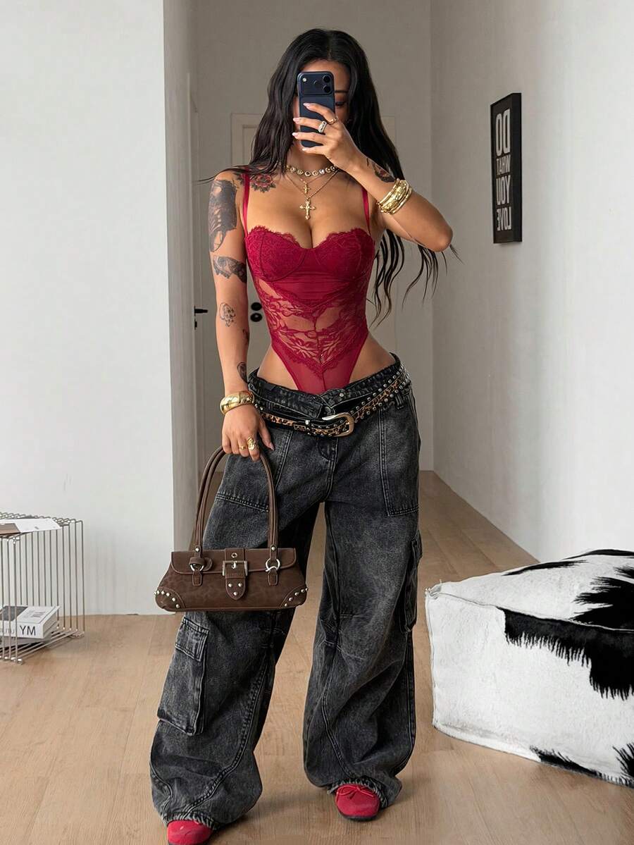 Fitted women's lace and mesh cami bodysuit with spaghetti straps.