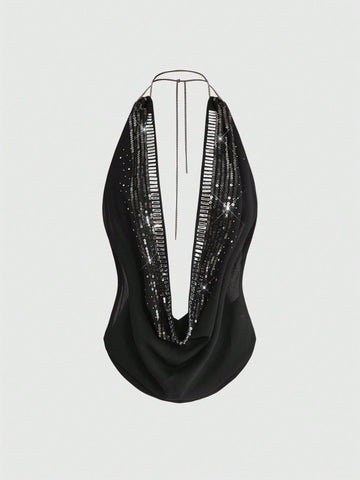 Women's draped neck backless halter crop tank top with studded details, letter pattern, semi-sheer chiffon fabric, and slim fit party style