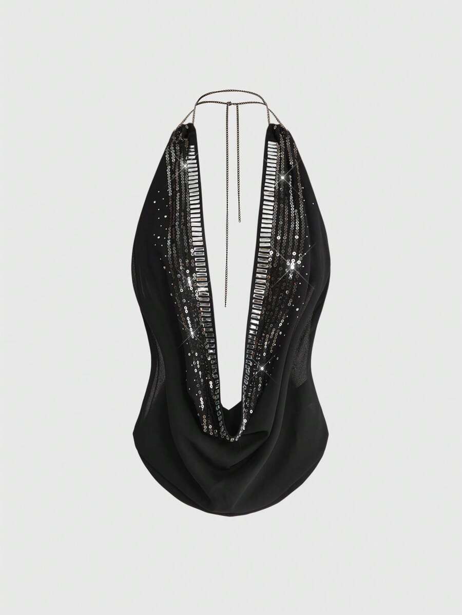 Women's draped neck backless halter crop tank top with studded details, letter pattern, semi-sheer chiffon fabric, and slim fit party style