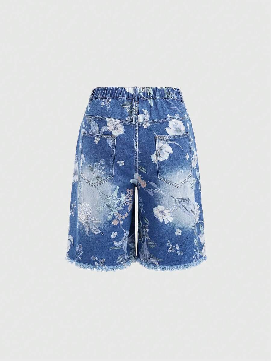 Women's loose wide-leg denim Bermuda shorts featuring vintage animal and paisley print with pockets and zipper fly.