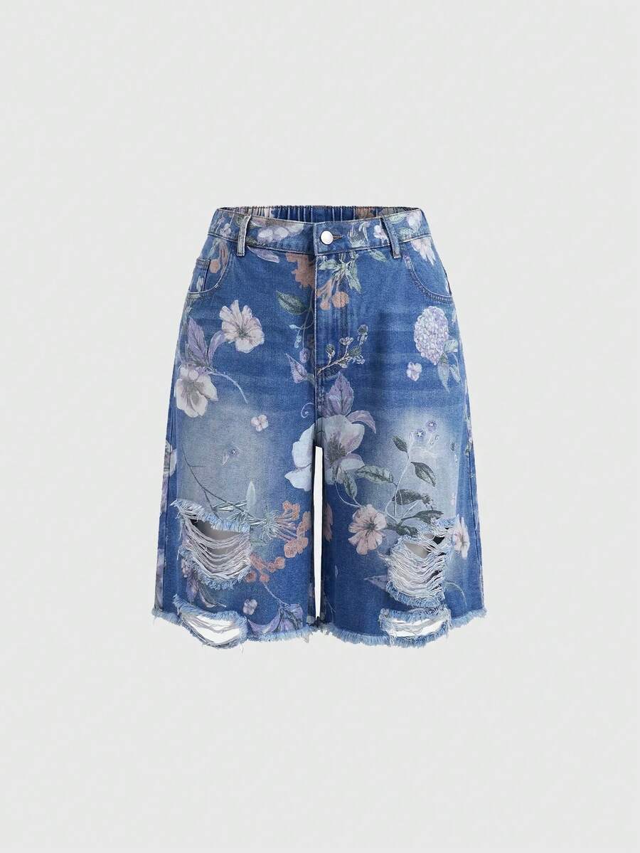 Women's loose wide-leg denim Bermuda shorts featuring vintage animal and paisley print with pockets and zipper fly.