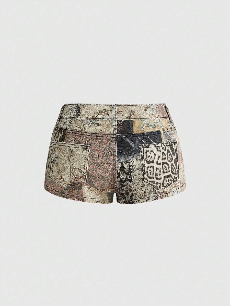 Vintage animal print ultra low waist mini shorts featuring button zipper closure, pockets, and regular fit.