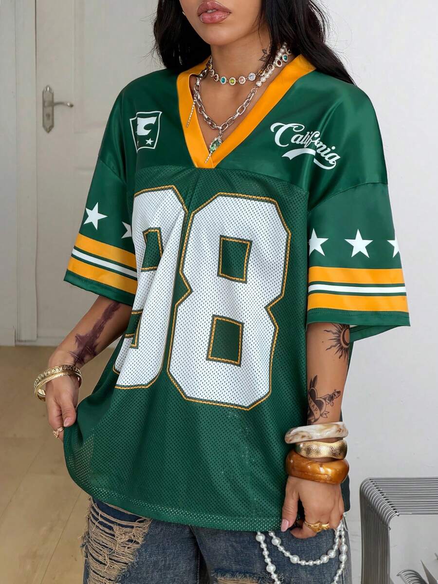 Green short sleeve graphic jersey t-shirt with V-neck and oversized fit