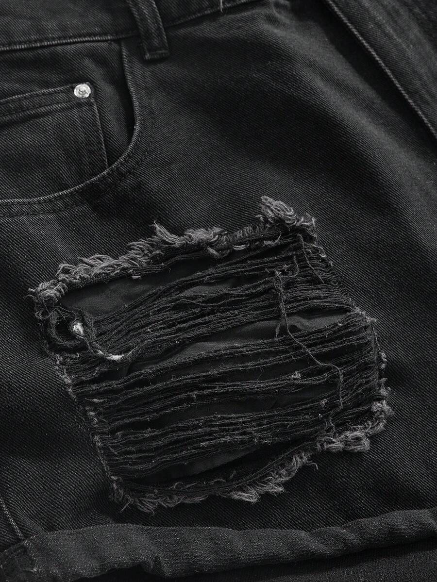 Front view of women's ripped denim shorts featuring raw hem, zipper fly, and pockets