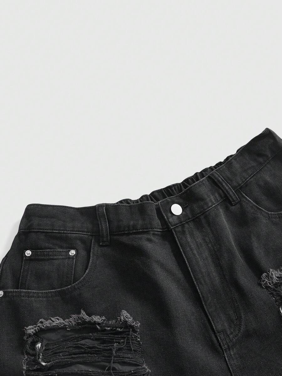 Front view of women's ripped denim shorts featuring raw hem, zipper fly, and pockets