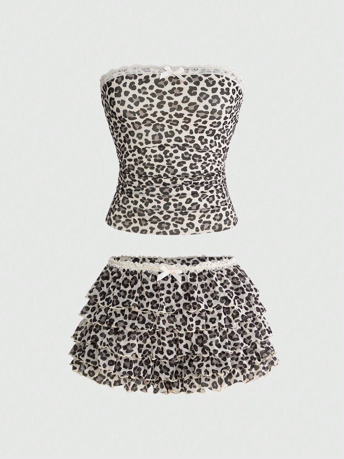 Y2K leopard print two-piece outfit with strapless bandeau top and ruffle mini shorts, featuring contrast lace and a slim fit