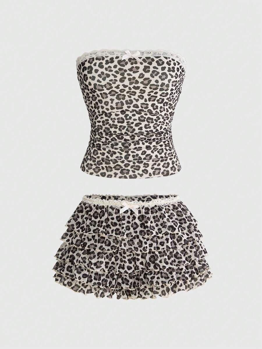 Y2K leopard print two-piece outfit with strapless bandeau top and ruffle mini shorts, featuring contrast lace and a slim fit
